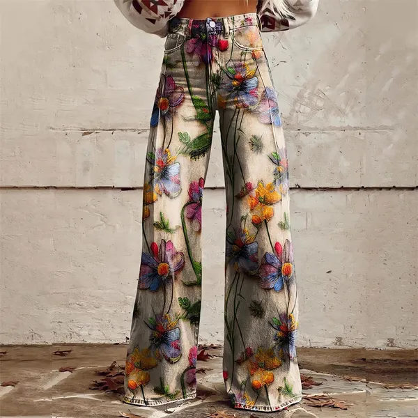 Close-up of celestial and floral print detail on Zampa jeans