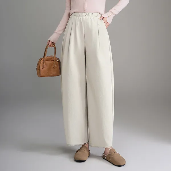 Islyn wide-leg trousers styled with a fitted top