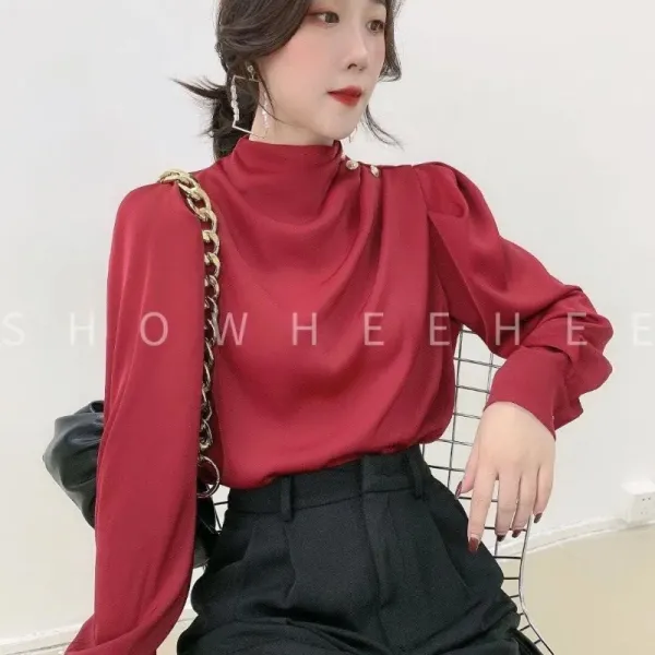 Camisa feminina manga longa botão — detalhe costas e textura do tecido