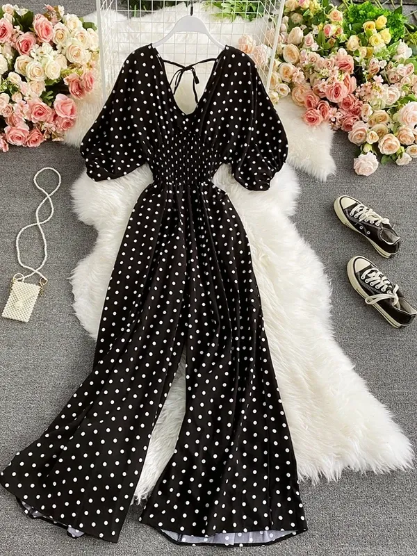 Macacão feminino elegante com estampa poá e manga morcego