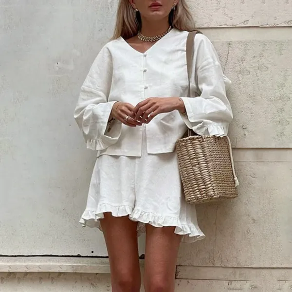 Conjunto feminino de linho camisa manga longa e shorts plissado — vista frontal